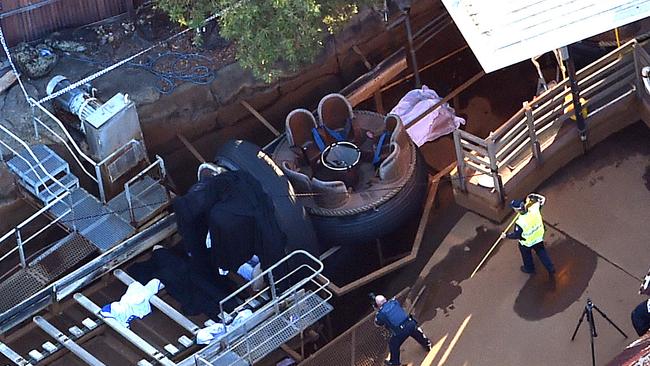 Queensland Emergency service personnel are seen at amusement theme park Dreamworld on the Gold Coast, Queensland, Tuesday, Oct. 25, 2016. (AAP Image/Dan Peled)