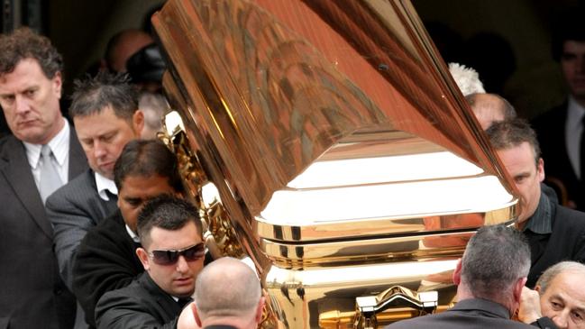 30/04/2010 NEWS: The gold coffin with the body of gangland killer Carl Williams leaves the funeral service at a church in Essendon, Melbourne. Pic. Stuart Mcevoy