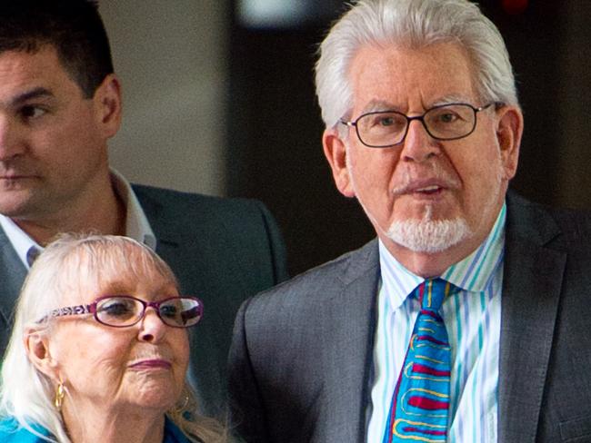 LONDON, ENGLAND - JUNE 30:  Artist and television personality Rolf Harris leaves court with his wife Alwen Hughes after being found guilty of 12 indecent assault charges at Southwark Crown Court after a seven week trial on June 30 2014 in London, England. 84-year-old Rolf Harris who has been found guilty of indecently assaulting four girls between 1968 and 1986, was arrested in March 2013 by police officers working for Operation Yewtree.  (Photo by Ben A. Pruchnie/Getty Images)