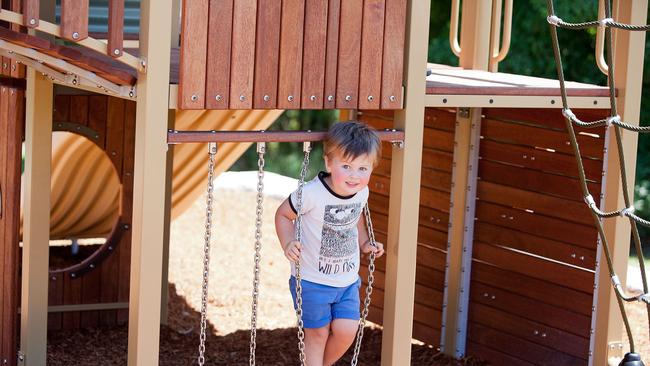 Ari Boorer (right), 2 playing in the new Rankin Park playground. Supplied: City of Newcastle