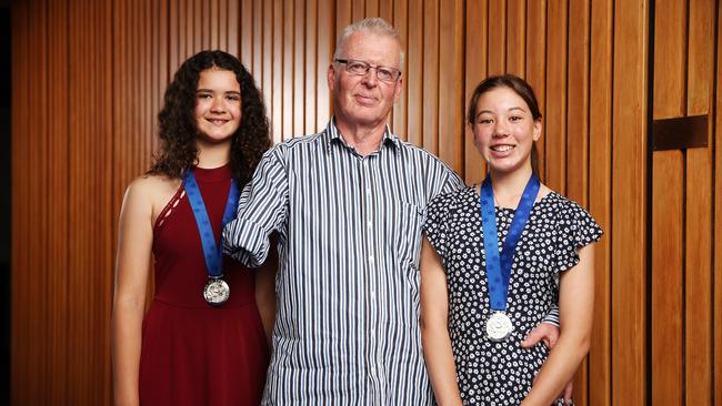 Colin Bailey with Aja and Ayumi. The two friends came to his aid and even made a makeshift tourniquet from a horse lead. Picture: Tim Hunter.