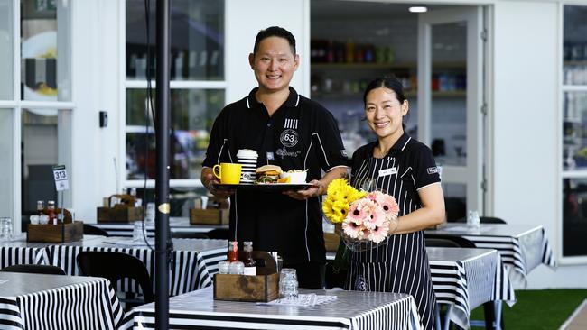 The first Cafe 63 in Cairns opened at Raintrees Shopping Centre earlier this year, selling food, coffee and fresh flowers. Cafe 63 Raintrees managers Minwoong 'Tim" Lee and Kyounghwa "Kate" Lee (pictured) said they looked forward to serving their customers good food, tea and coffee and flowers to takeaway. Picture: Brendan Radke