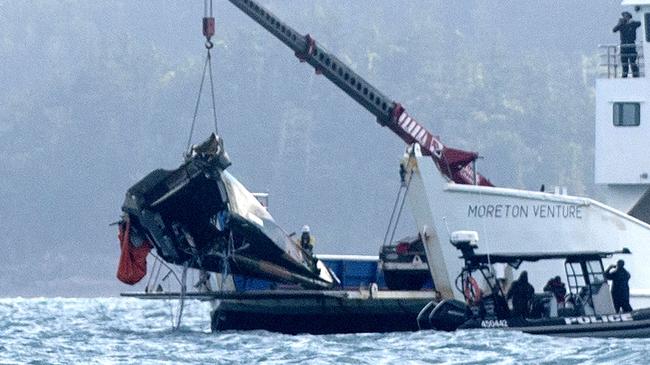 A barge anchored at the site where a MRH 90 Taipan military helicopter crashed.