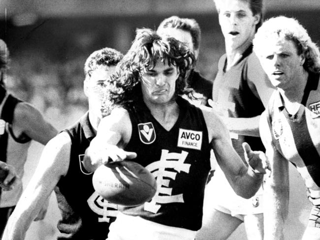 Carlton‘s Tom Alvin gets a kick away. Picture: CLIVE MACKINNON