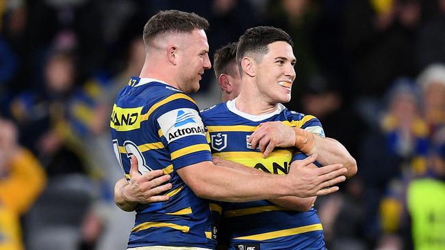 Mitchell Moses of the Eels (right) celebrates with Nathan Brown (left) following their win over the Knights in the Round 21 NRL match between the Parramatta Eels and the Newcastle Knights at Bankwest Stadium in Sydney, Saturday, August 10, 2019. (AAP Image/Dan Himbrechts) NO ARCHIVING, EDITORIAL USE ONLY