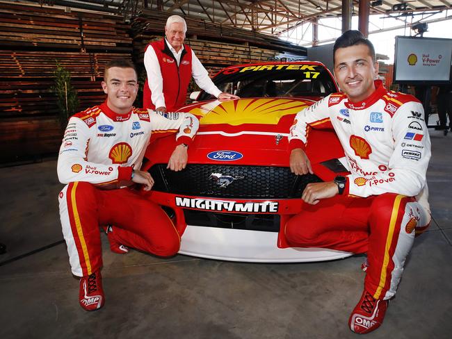 Drivers Scott McLaughlin and Fabian Coulthard with their brand-new Shell V-Power Racing Team Ford Mustang Supercar alongside Motorsport Legend Dick Johnson. Picture: DAVID CAIRD