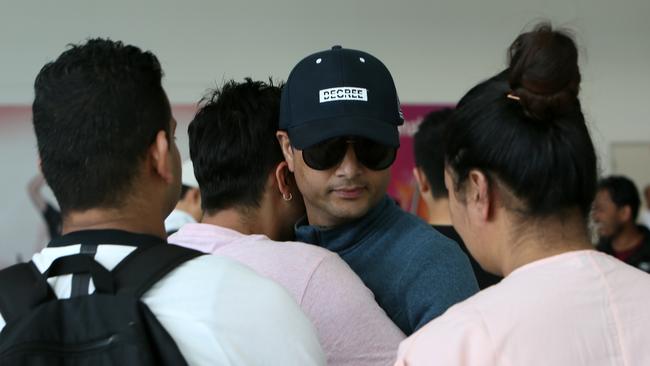 Ghanashyam Ghimire at Adelaide Airport after flying in to bring his brother’s body home. Picture: AAP / Emma Brasier 