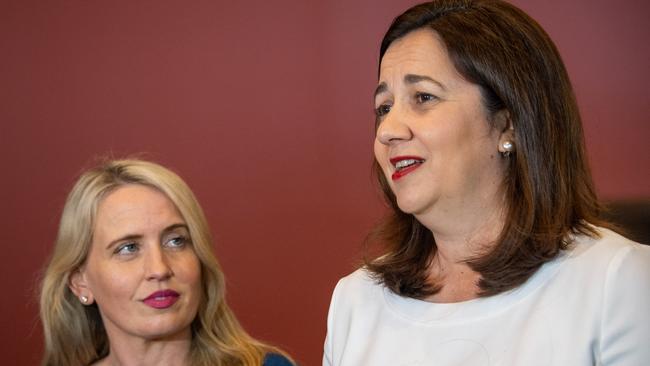 Premier Annastacia Palaszczuk (right) has named Tourism Minister Kate Jones (left) to assist her in costing the 2032 Olympics bid. Picture: AAP/Brian Cassey