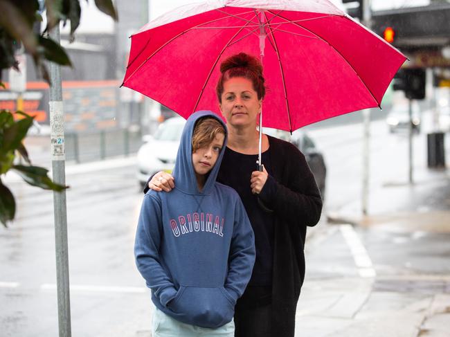 Catherine Stewart and her son Max are among residents opposed to the use of Smith St as the store’s main entrance. (AAP Image/Jordan Shields)