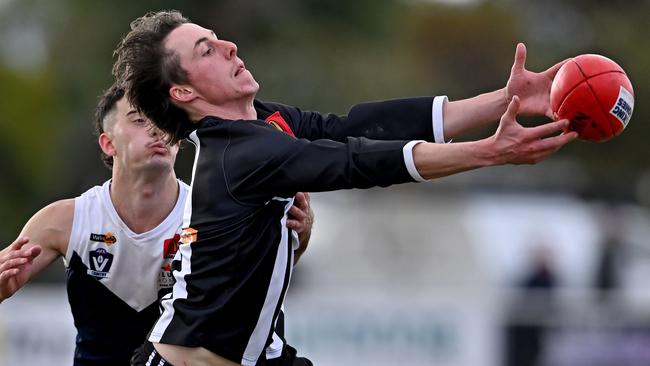 Darley’s Daniel Lalor stretches for the ball. Picture: Andy Brownbill