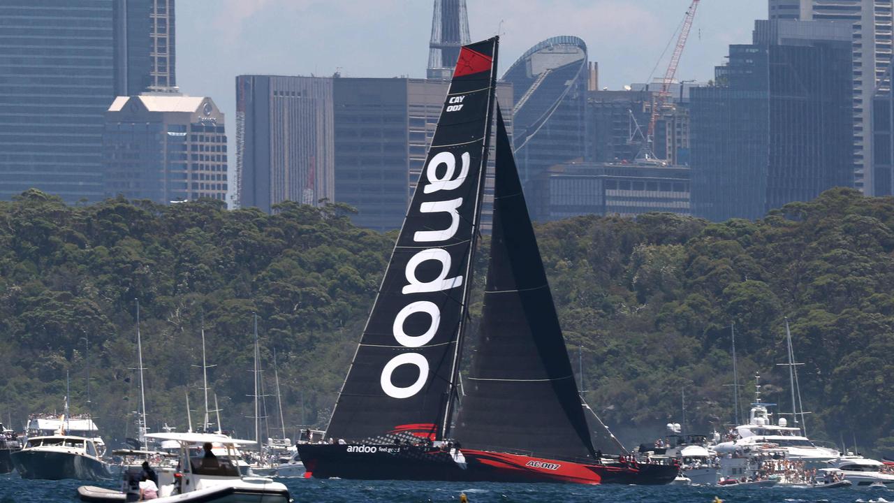 Andoo Comanche sailing through the spectator fleet.