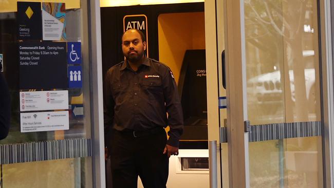 Security staff at the entrance to the Commonwealth Bank Malop St. Picture: Alison Wynd