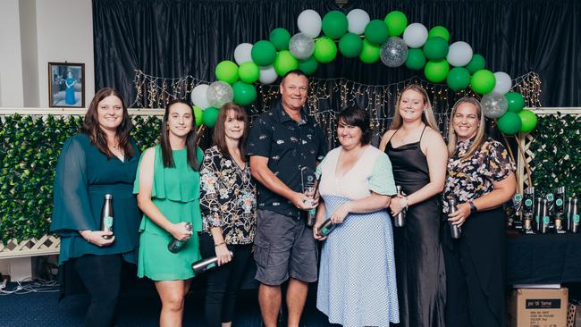 Lisa Milgate and other members of the Beerwah Glasshouse United football club.