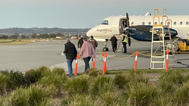 Passengers board a Rex flight to Melbourne. Picture: Patrick Morrow