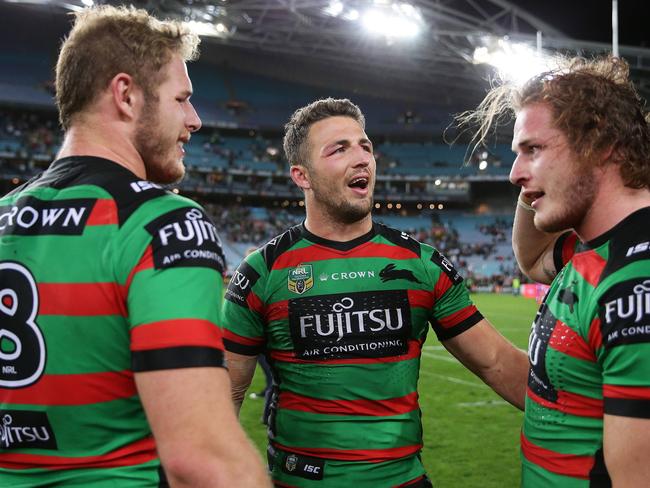 Souths Sam Burgess with his brothers Tom and George after victory in the South Sydney v St. George-Illawarra NRL Semi Final at ANZ Stadium, Homebush. Picture: Brett Costello