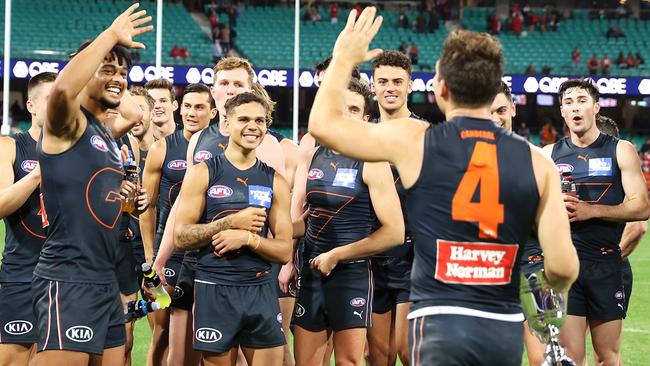 Toby Greene and the Giants celebrate a famous victory.