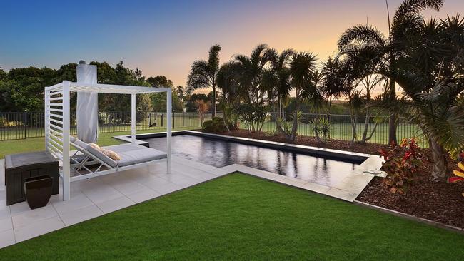 The property also boasts a landscaped garden, two-bay garage and in-ground pool. Picture: Contributed