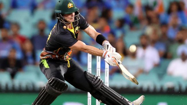 Steve Smith plays a ramp shot during Sunday night’s T20 international against India Picture: AFP