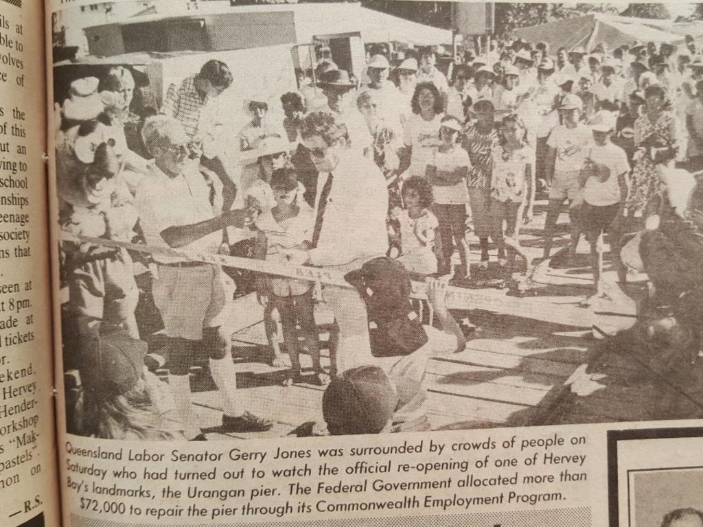 Qld Labor senator Gerry Jones officially reopens the Urangan Pier on October 25, 1986, surrounded by crowds who attended the inaugural Pier Festival. Credit: Hervey Bay Historical Village & Museum.
