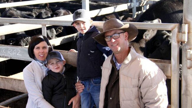 “We were lucky to get a head start”: The Shaw family at a weaner sale at Roma saleyards.