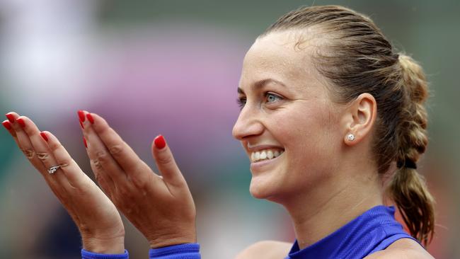 Petra Kvitova thanks the crowd after winning her French Open first round match against Julia Boserup. It was Kvitova’s first match after she was stabbed in the hand by an intruder in her apartment.