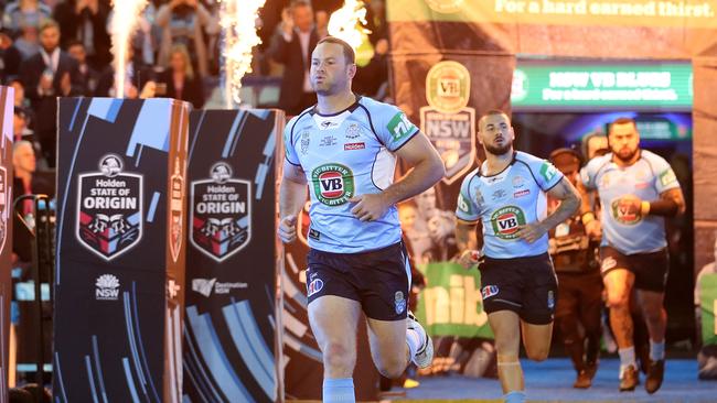 Boyd Cordner of the Blues runs onto the field.