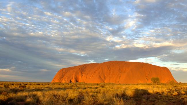 Uluru at sunset, Uluru-Kata Tjuta National Park. Photo: Michael Nelson, Parks Australia