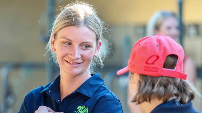 Jockey Jamie Kah chats with colleague and former Champion Australian Jockey Clare Lindop at stables in Morphettville Racecourse. Picture: Russell Millard Photography