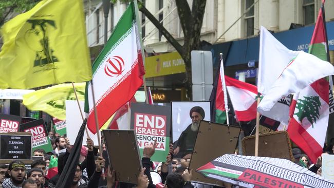 A man is expected to face court after allegedly waving the Hezbollah flag in the CBD. Picture: Valeriu Campan