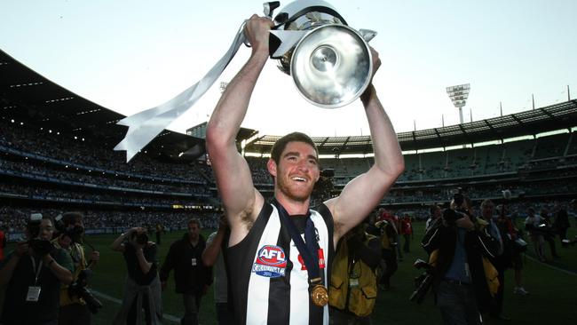 Tyson Goldsack with the 2010 premiership cup.