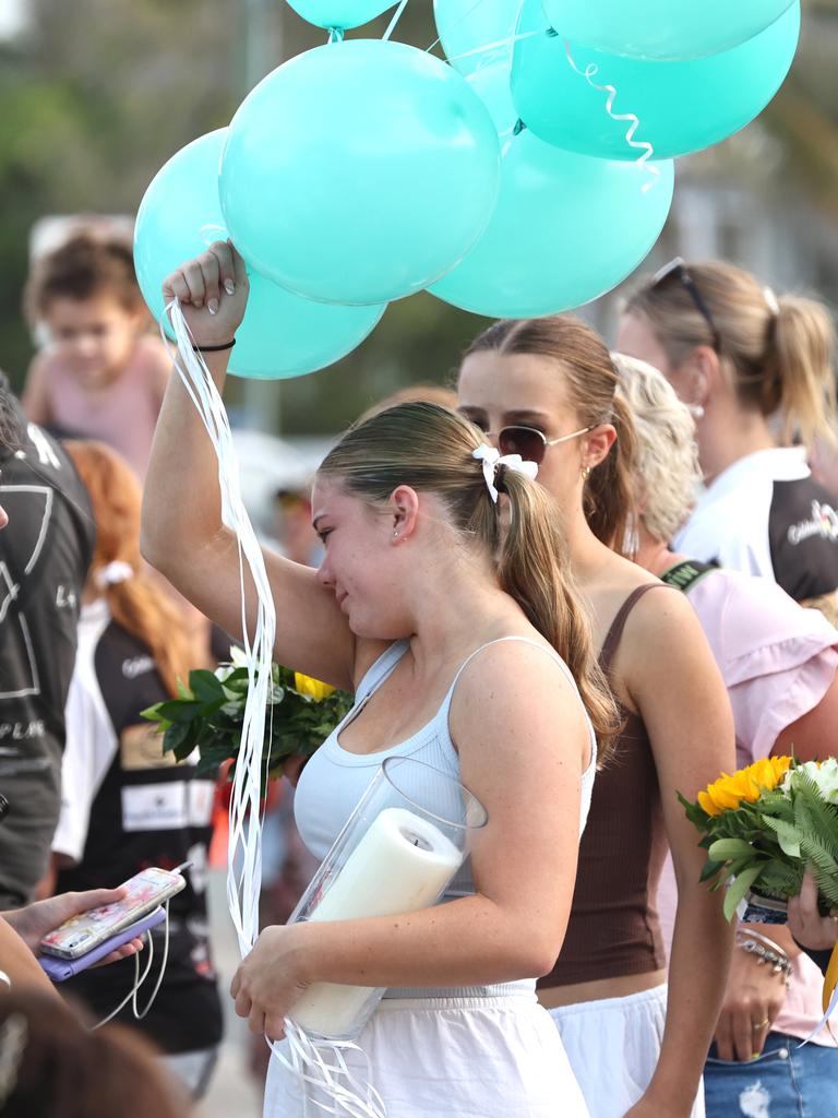 Hundreds of people have gathered at Bribie Island for a vigil to honour 17-year-old shark attack victim Charlize Zmuda. Picture: David Clark