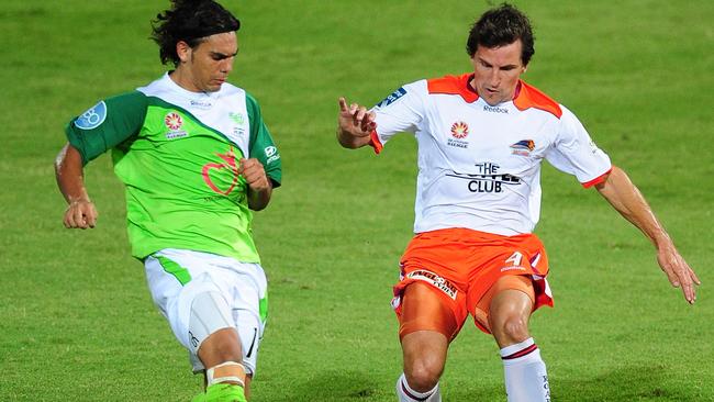 TOWNSVILLE, AUSTRALIA - DECEMBER 18: Shane Stefanutto of the Roar contests the ball with David Williams of the Fury during the round 19 A-League match between the North Queensland Fury and the Brisbane Roar at Dairy Farmers Stadium on December 18, 2010 in Townsville, Australia. (Photo by Ian Hitchcock/Getty Images)