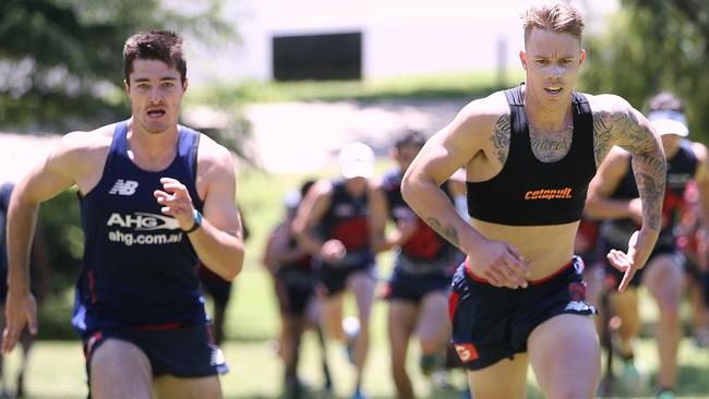 James Harmes and Alex Neal-Bullen take part in the hill sprints. Picture: Wayne Ludbey