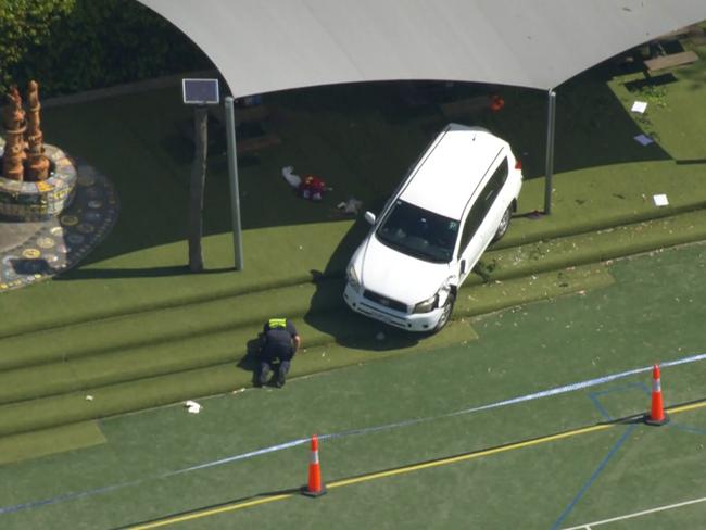 A car crashed through a fence at Auburn South Primary School in Hawthorn East, killing a student. Picture: 7NEWS