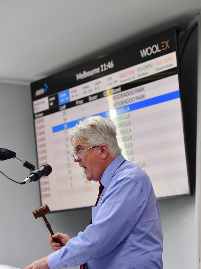 Eamon Timms takes the bids during the wool auctions. Picture: Zoe Phillips