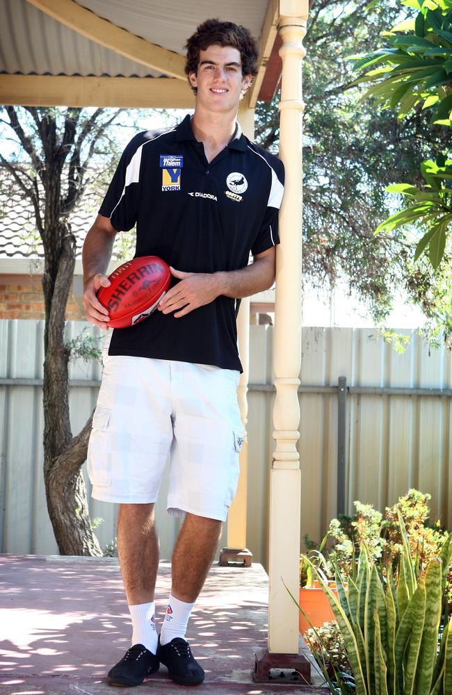 Scott Lycett, 17, at his home in Ethelton in 2010 ahead of his SANFL debut for the Magpies.