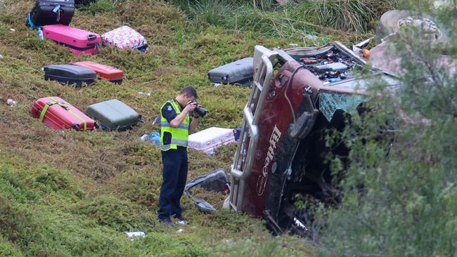 A truck driver faces almost 50 charges after his truck crashed into the back of a school bus . Picture: Brendan Beckett