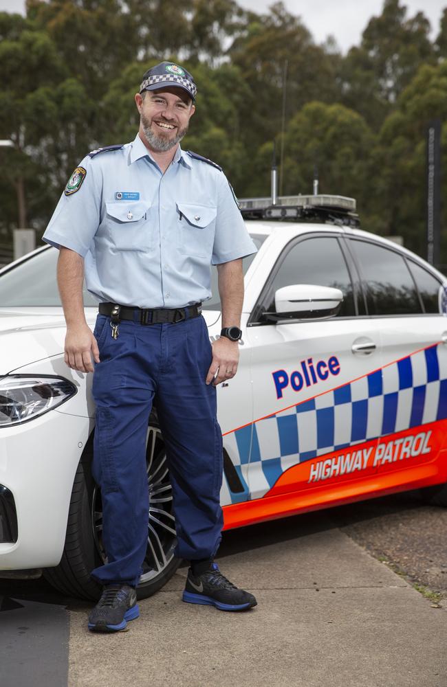 Triumph over tragedy: Senior Constable Jonathan Wright gets back to work after losing his leg in the accident. Picture: Justin Lloyd