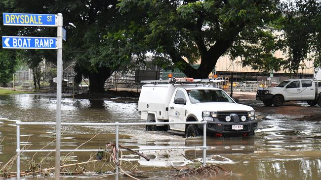 Tuesday February 4. Heavy rain causes flooding in North Queensland. A car navigates Mill Street, in Giru after flooding. Picture: Evan Morgan