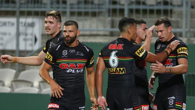 SYDNEY, AUSTRALIA - MARCH 20: Brent Naden of the Panthers celebrates with teammates after scoring a try during the round 2 NRL match between the St George Illawarra Dragons and the Penrith Panthers at Netstrata Jubilee Stadium on March 20, 2020 in Sydney, Australia. Due to the COVID-19 virus outbreak, the fixture will be played with no fans in attendance due to a NSW Public Health Order prohibiting outdoor events with more than 500 people.  (Photo by Jason McCawley/Getty Images)