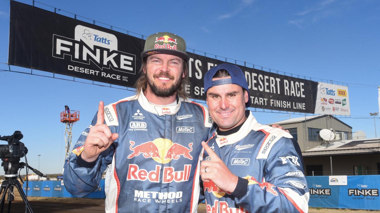 Toby Price and Jason Duncan after they won the 2022 Tatts Finke Desert Race. Mr Price will appear at the kick-off party for the race on Thursday evening. Photo: Supplied