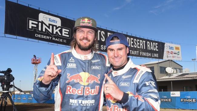 Toby Price and Jason Duncan after they won the 2022 Tatts Finke Desert Race. Mr Price will appear at the kick-off party for the race on Thursday evening. Photo: Supplied