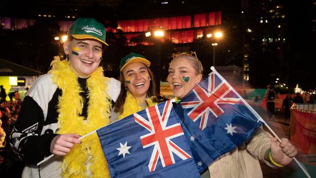 Excited fans Isabella Leslie, Jessica Helinski and Tashi Taylor gather at Tumbalong Park. Picture: NCA NewsWire/ Brendan Read