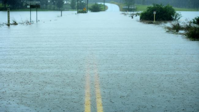 Water levels continue to rise and close off roads as residents in the Hawkesbury area keep a watch on the rising floodwaters. Picture: NCA NewsWire / Jeremy Piper