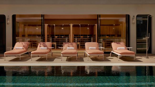 The mineral pool with saunas and cold plunge pools in the background.