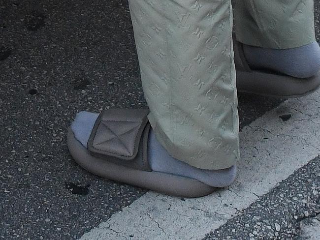 Kanye’s choice of footwear raised eyebrows.