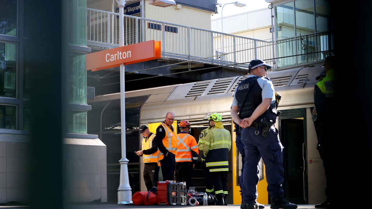 Emergency services at Carlton train station where a man and his daughter died. Picture: NewsWire / Damian Shaw