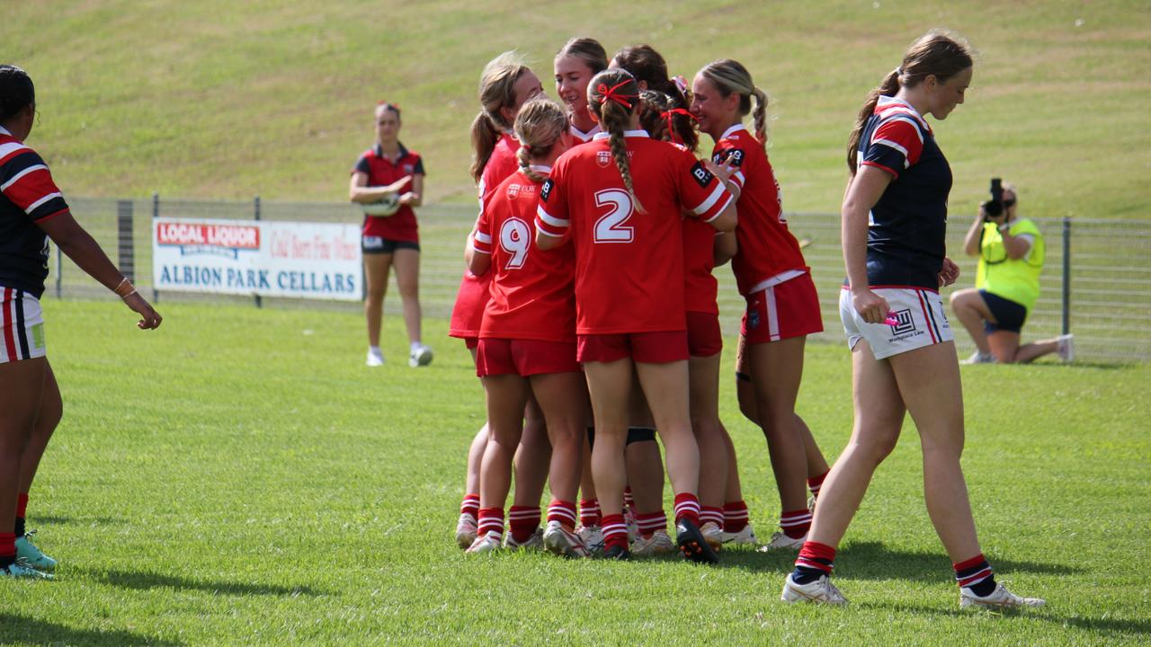 The Illawarra Steelers Lisa Fiaola Cup side celebrate a try. Picture: Kevin Merrigan