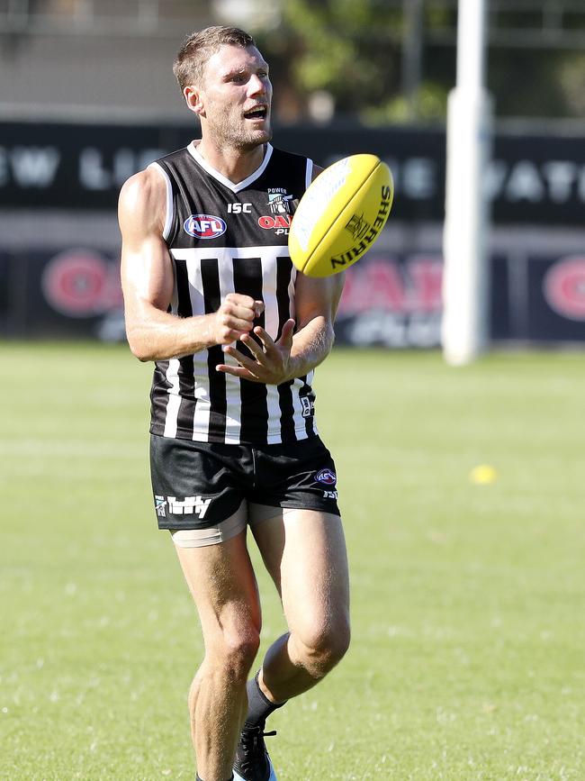 Brad Ebert wearing a prison-bar guernsey at training last year. Picture: Sarah Reed