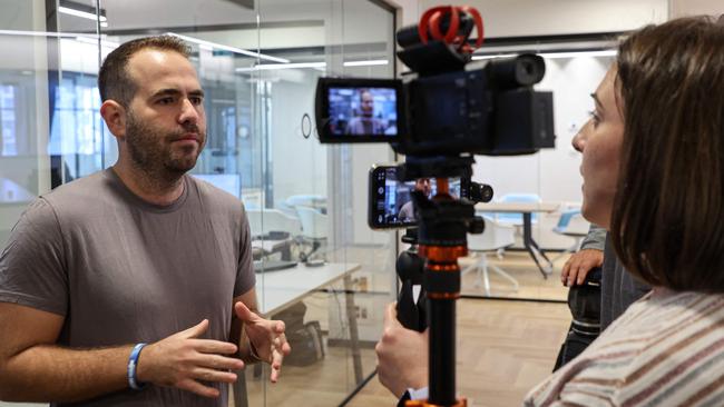 Israeli soldier Ofer, injured in the Gaza Strip, gives an interview at the Ichilov medical centre in Tel Aviv on Monday. Picture: AFP